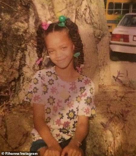 She was signed by Def Jam Recordings in 2005 after record producer Evan Rogers discovered her and sent Def Jam's president, Jay-Z, her demo. She is pictured as a kid