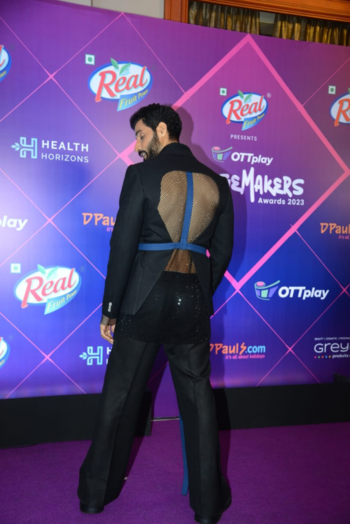 Bhuvan Arora in a backless black suit