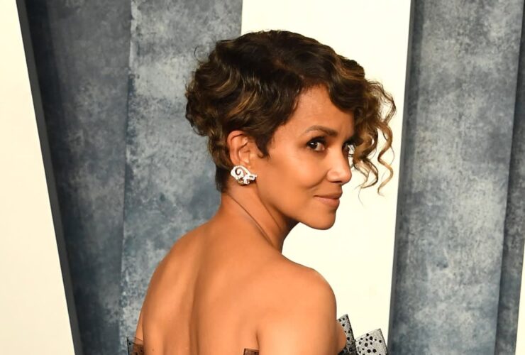 Halle Berry turns up the heat in tiny black string bikini