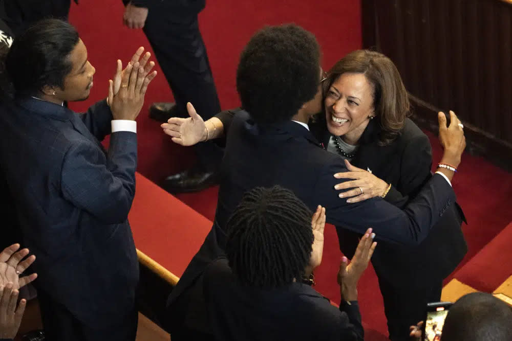 Vice President Kamala Harris hugs expelled Rep. Justin Pearson, D-Memphis, before Harris speaks at Fisk University, Friday, April 7, 2023, in Nashville, Tenn. (AP Photo/George Walker IV)