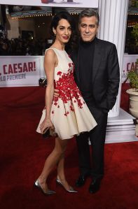 WESTWOOD, CA - FEBRUARY 01:  Actor George Clooney (R) and Amal Clooney attend Universal Pictures' "Hail, Caesar!" premiere at Regency Village Theatre on February 1, 2016 in Westwood, California.  (Photo by Kevin Winter/Getty Images)