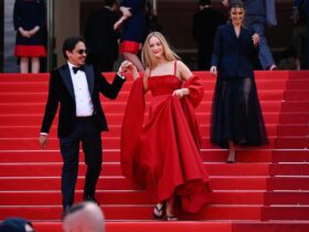 Jennifer Lawrence Pairs Dior Ball Gown with Chunky Flip-Flops at Cannes Film Festival