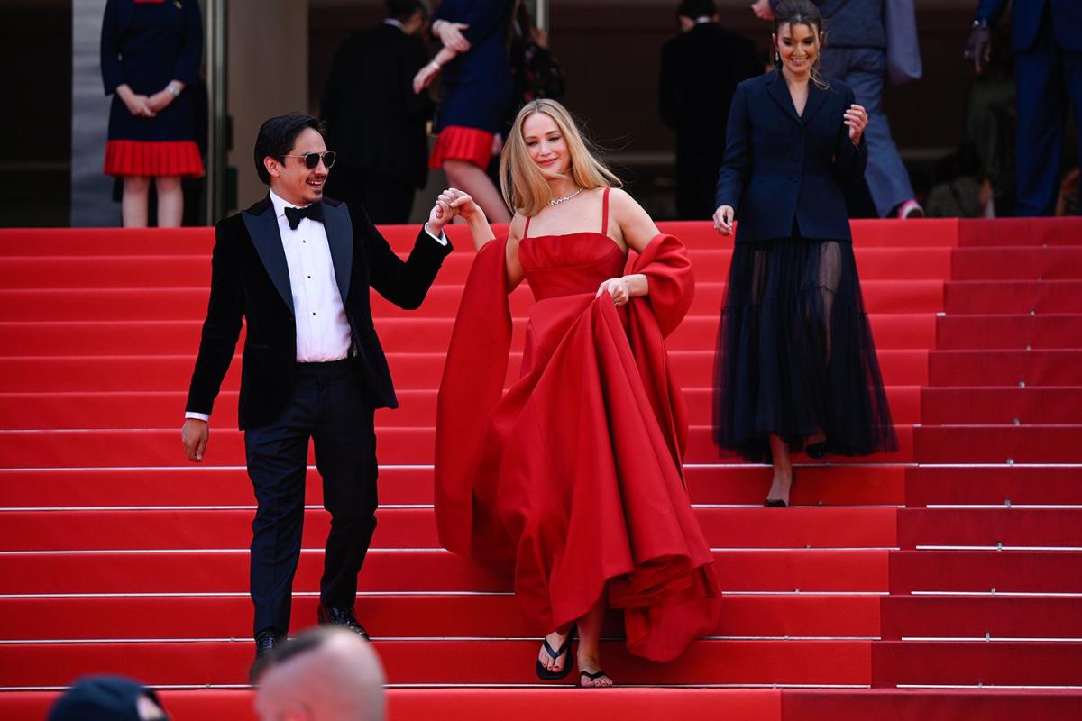 Jennifer Lawrence Pairs Dior Ball Gown with Chunky Flip-Flops at Cannes Film Festival