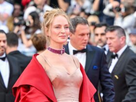 Uma Thurman Hit Cannes in a Cape Gown With Son Levon