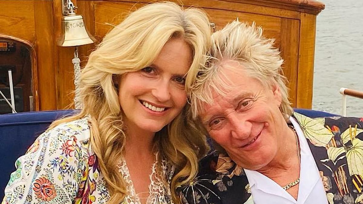 Penny Lancaster is a sunkissed vision in plunging beach dress