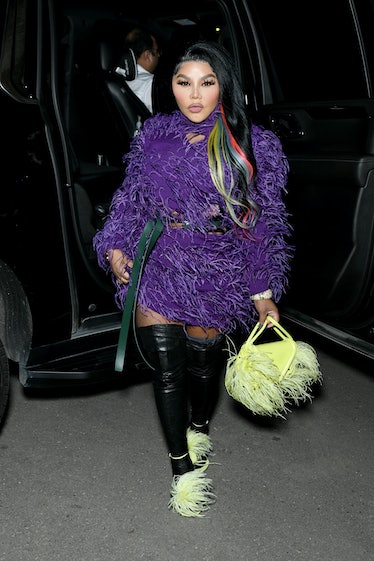 Lil' Kim arrives at the Bottega Veneta Salon 03 Presentation at Michigan Theater on October 21, 2021