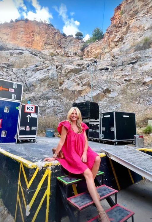 Penny Lancaster in a pink mini dress