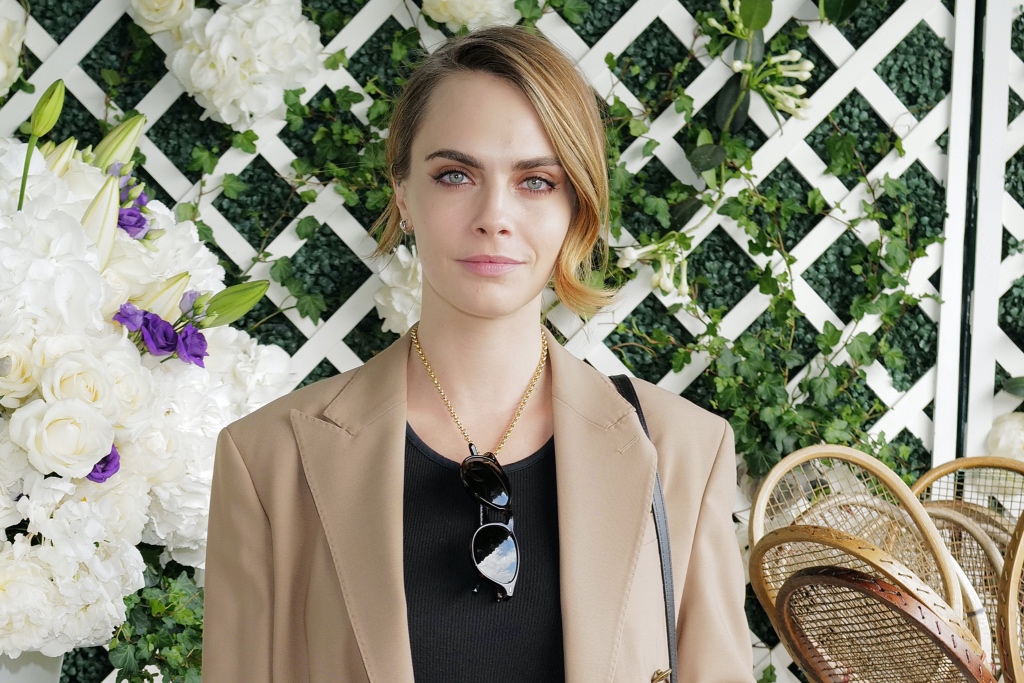 Cara Delevingne Dons Combat Boots & Ralph Lauren Blazer at Wimbledon – Footwear News