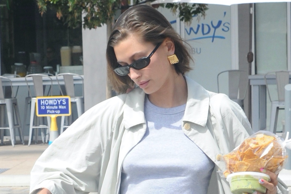 Hailey Bieber Slips on Gold-Embellished Flats With Justin Bieber – Footwear News