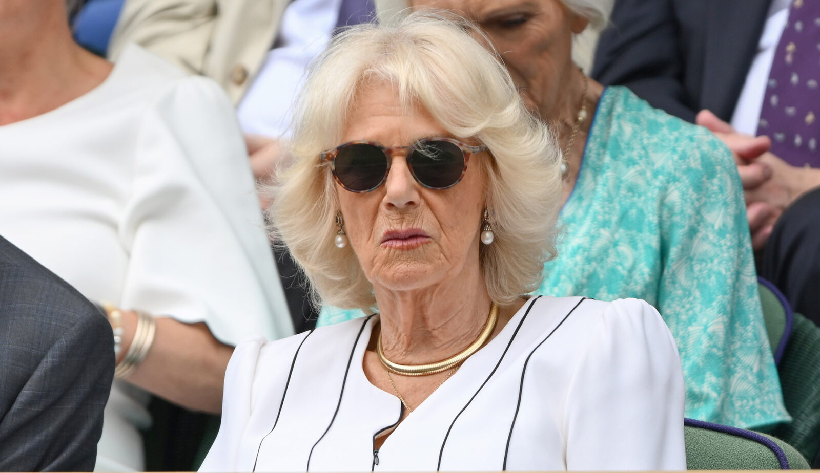 Queen Camilla Goes White at Wimbledon 2023 in Tunic Dress & Pumps – Footwear News