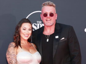 Pat McAfee’s Wife Samantha Slips on Knotted Silk Sandals at ESPYs 2023 – Footwear News