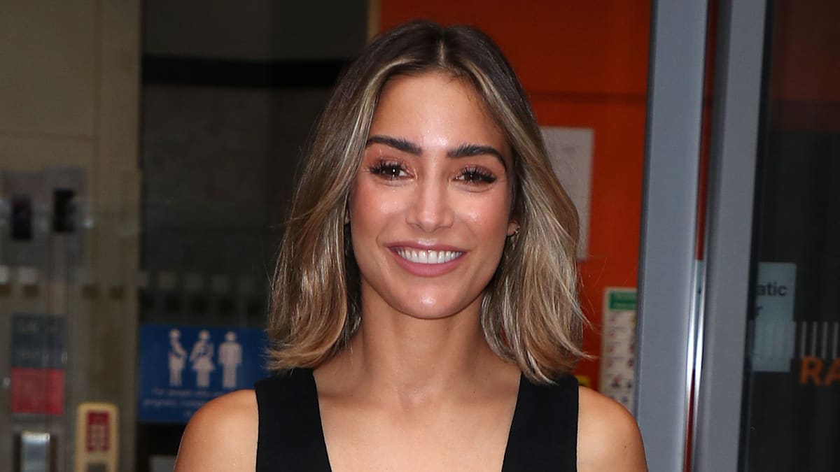 Frankie Bridge stuns in ab-baring vest and low-rise trousers