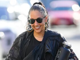 Tia Mowry Dances in  White Converse Sneakers With Her Son Cree – Footwear News