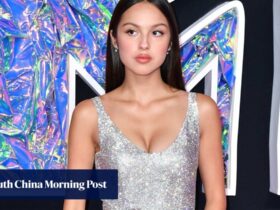 Olivia Rodrigo’s dazzling luxury designer style: the ‘Vampire’ singer is a Y2K queen in Versace and Jimmy Choo, goes sheer in Gucci and Miu Miu, and rocks vintage Chanel dresses