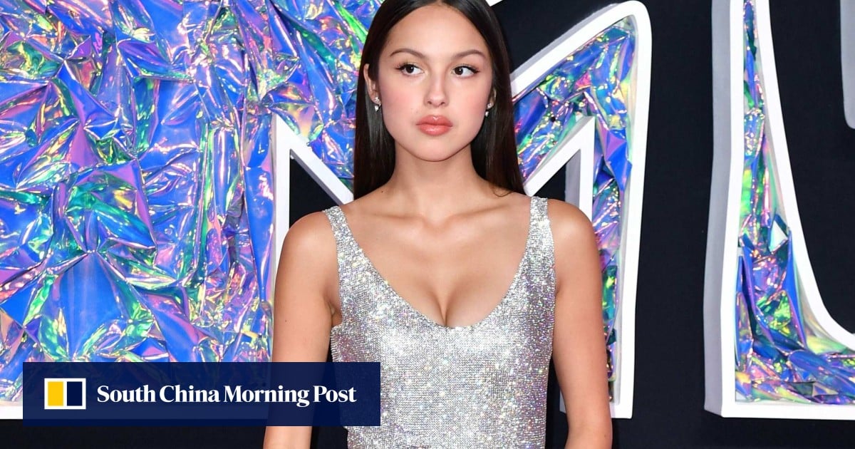 Olivia Rodrigo’s dazzling luxury designer style: the ‘Vampire’ singer is a Y2K queen in Versace and Jimmy Choo, goes sheer in Gucci and Miu Miu, and rocks vintage Chanel dresses