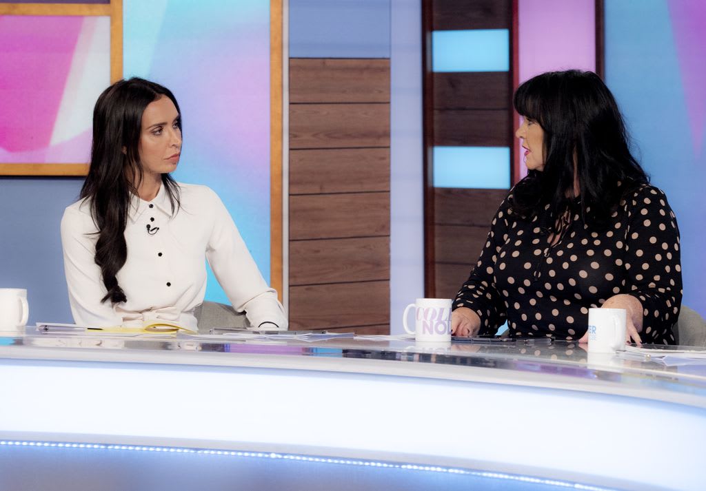 christine talking to coleen nolan in white dress 