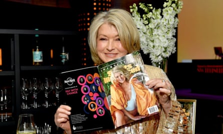 Martha Stewart holding Sports Illustrated Swimsuit magazine