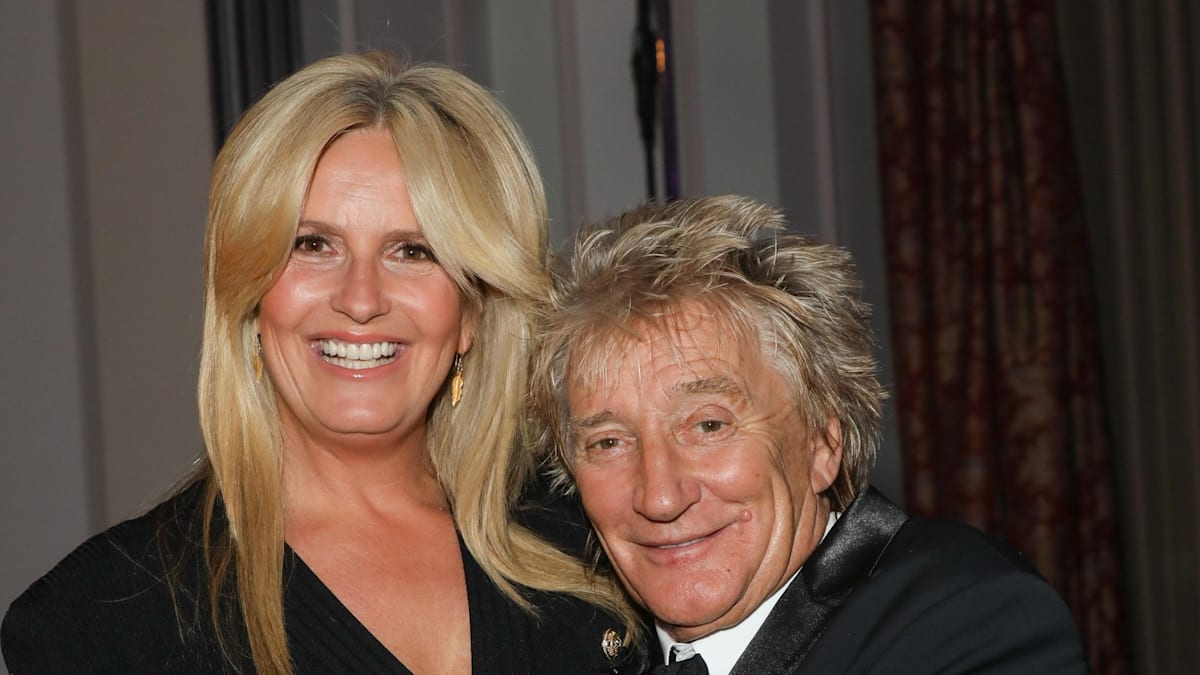 Penny Lancaster looks fabulous in fiery red leg-split dress for party with Rod Stewart