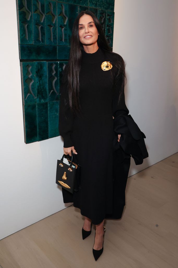 demi moore black dress frequency exhibition