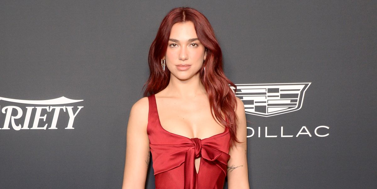 Dua Lipa Matches Her Corseted Gown to Her Hair in the Perfect Holiday Party Look