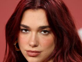 Dua Lipa stuns in short shorts and sheer stockings for Tokyo outing