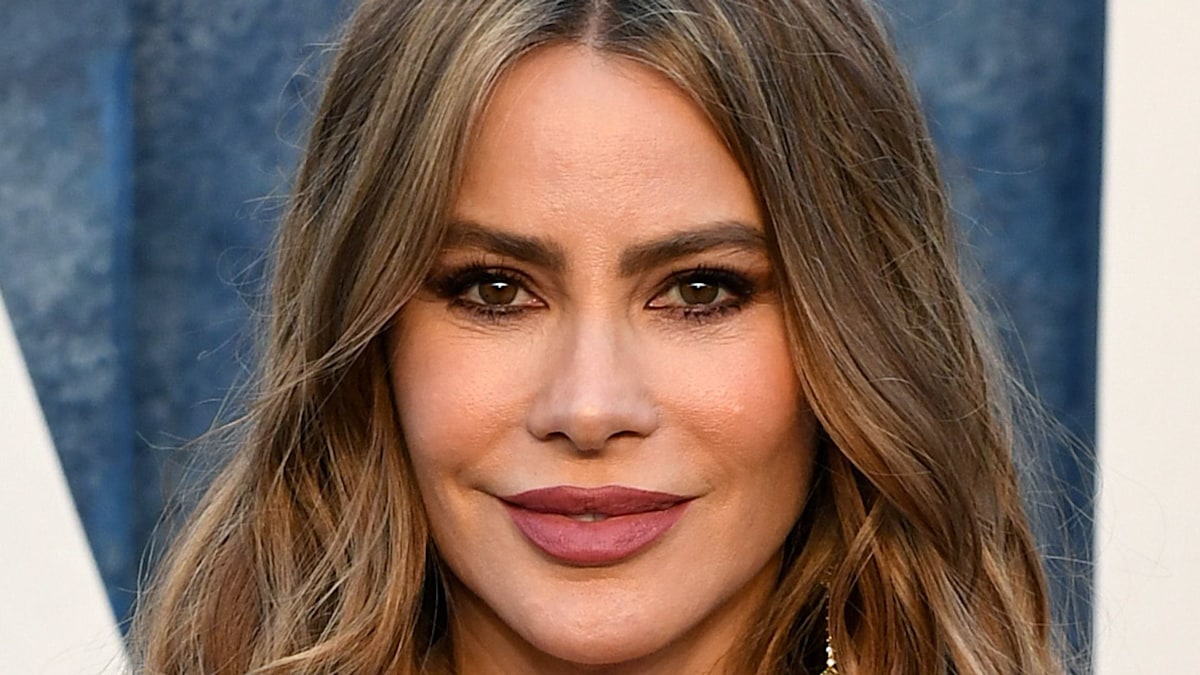 Sofia Vergara looks phenomenal in sumptuous chocolate brown thigh-split dress