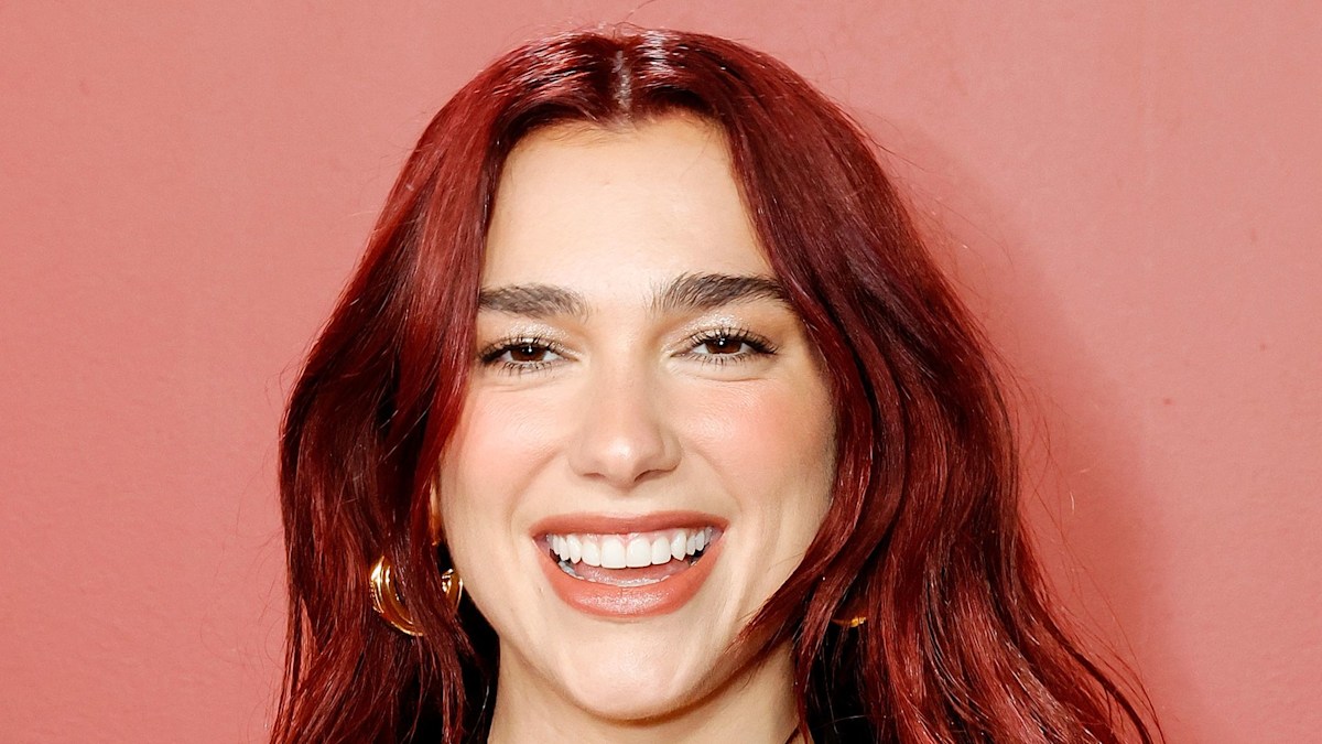 Dua Lipa is a scarlet mermaid in skintight satin dress after hair transformation