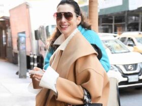 Anne Hathaway Joins the Decorated Birkin Club With a Playful Scarf and Charm