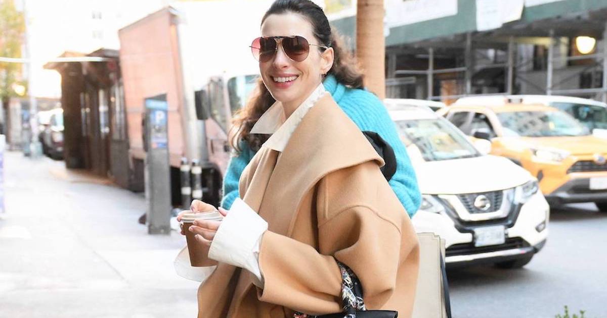 Anne Hathaway Joins the Decorated Birkin Club With a Playful Scarf and Charm